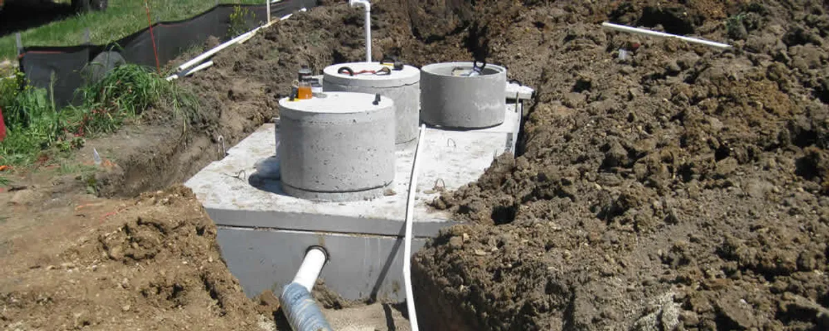 Septic system repair and installation site with tank access ports in El Paso, TX