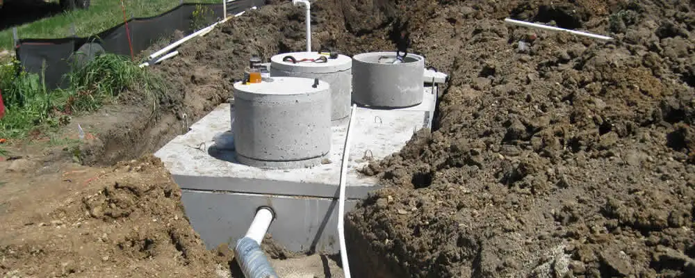 Septic system repair and installation site with tank access ports in El Paso, TX